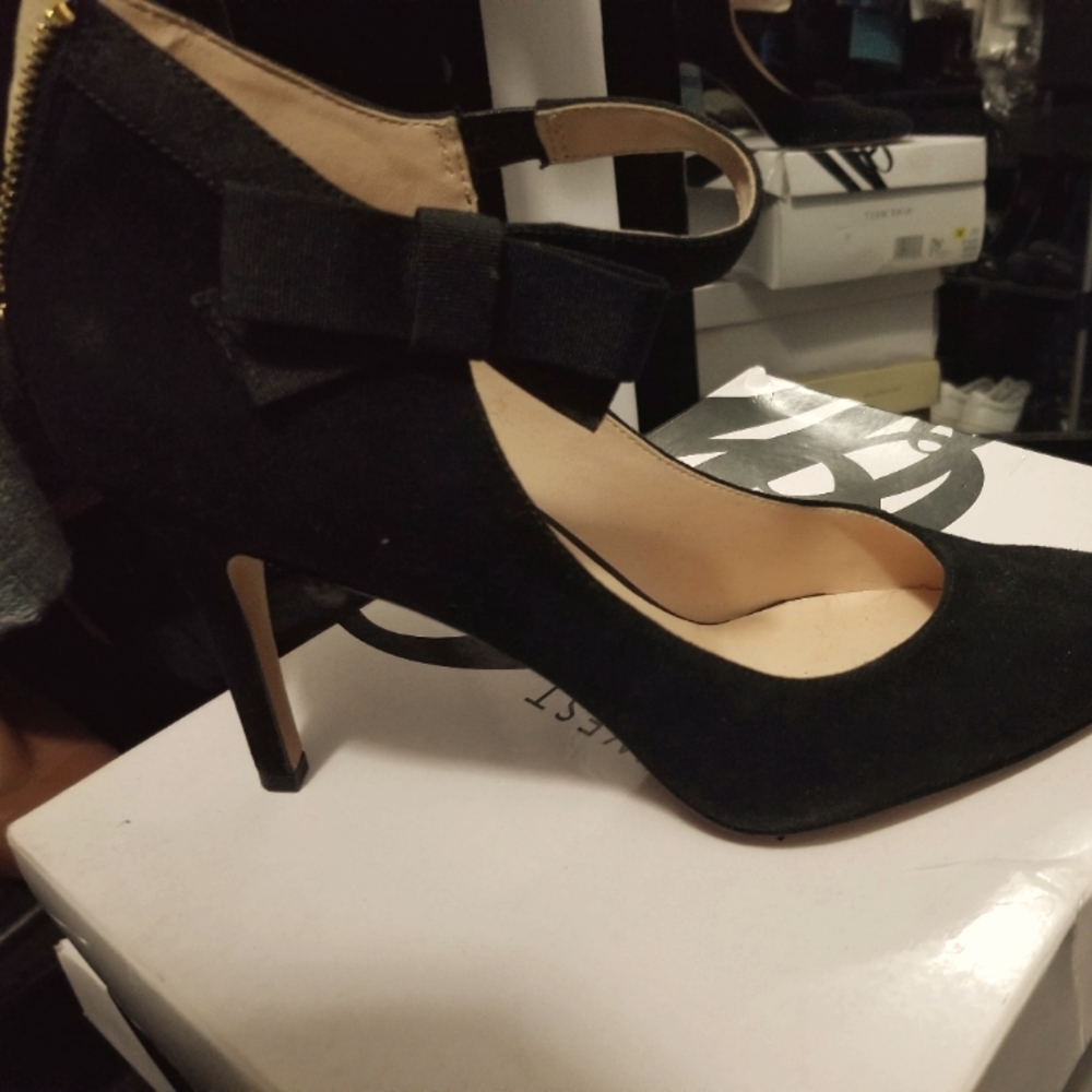 Suede zipper up heels with bow detail on side